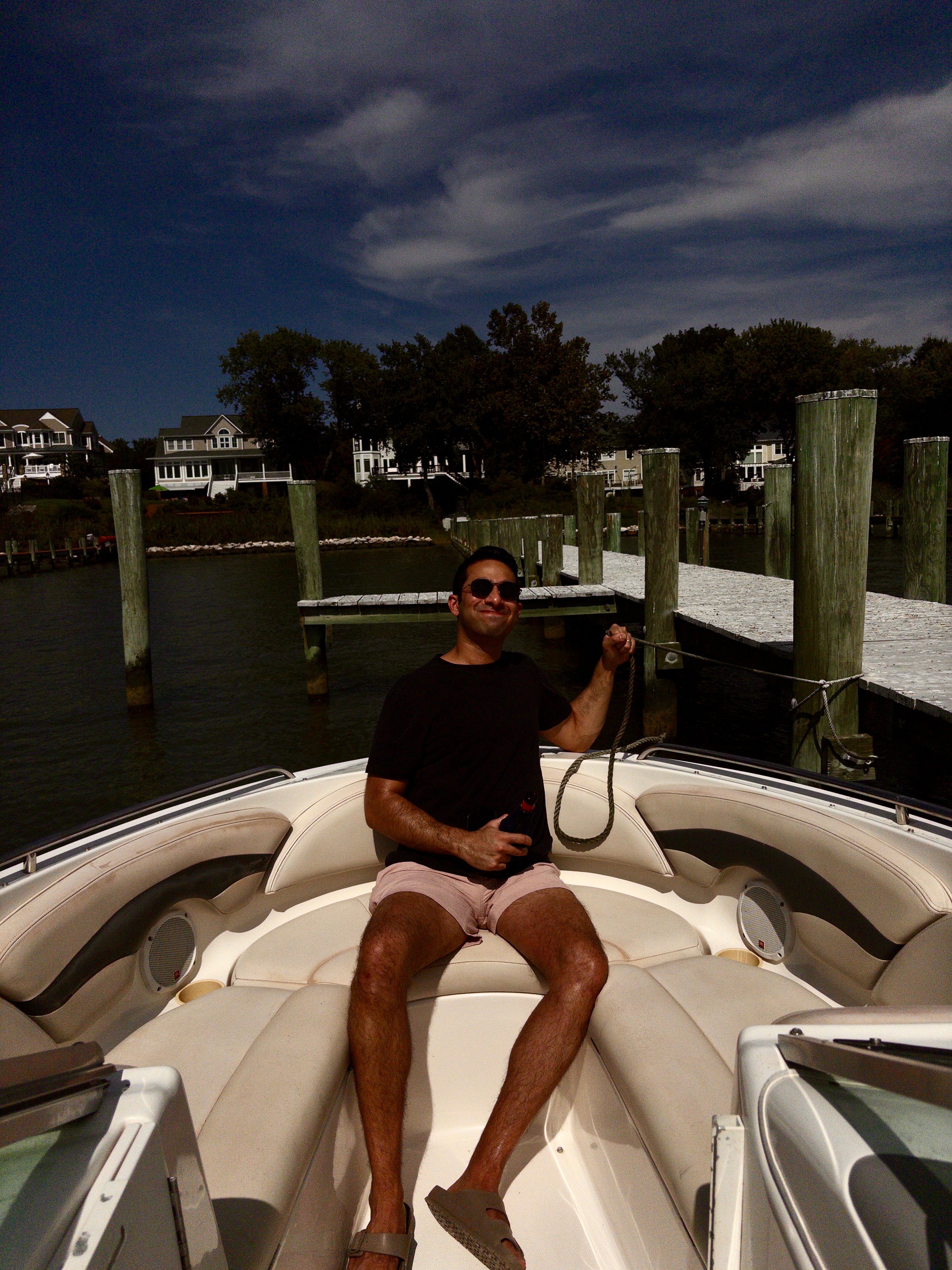 On the bow of a motorboat at the dock, Rhode River